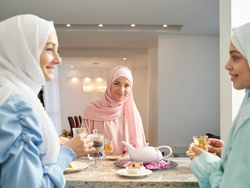 pleasant-friendly-meeting-of-three-muslim-friends-3LBMV5T.jpg